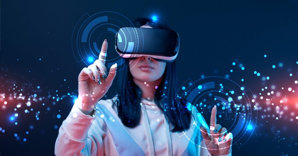 Woman shown with 3D or virtual reality glasses interacting with an interface.