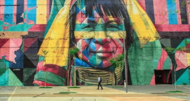 Large mural painting of indigenous person.