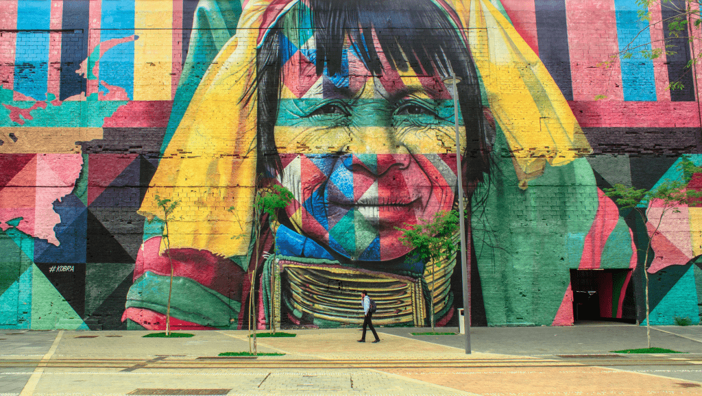 Large mural painting of indigenous person.