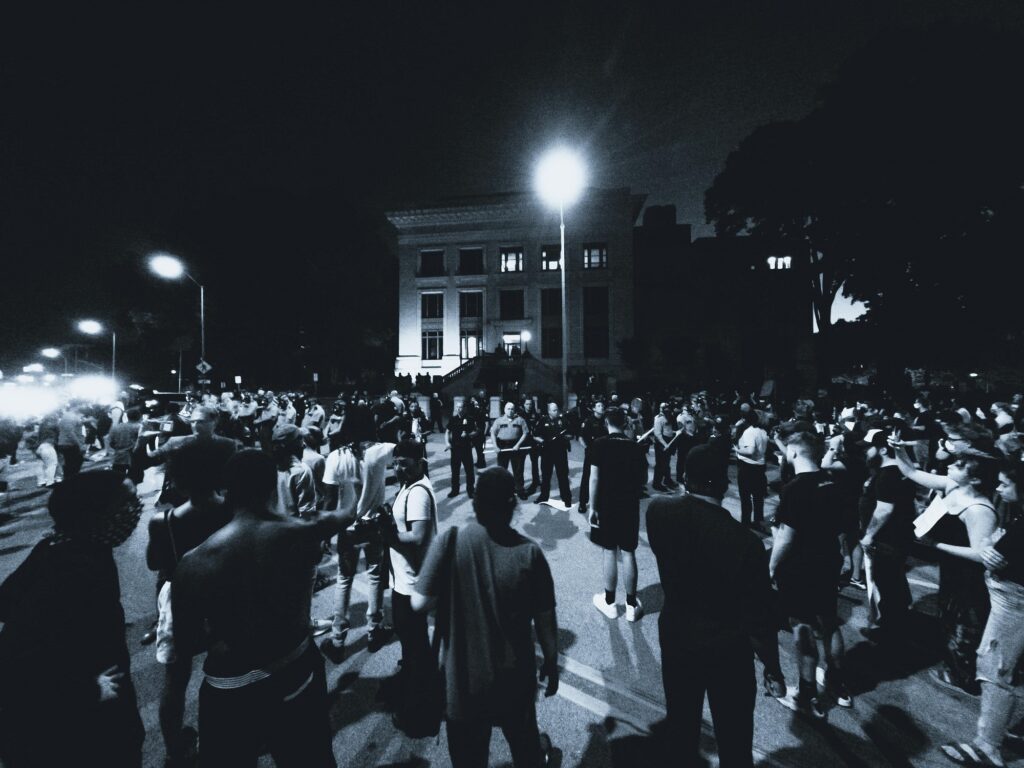 Greyscale image of protesters.