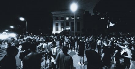 Greyscale image of protesters.