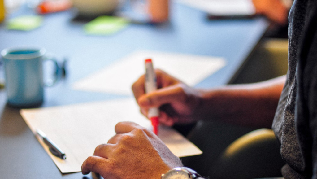 Person working on a stakeholder profile.