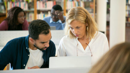 People working on computer to represent citizen relationship management software