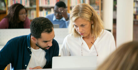 People working on computer to represent citizen relationship management software
