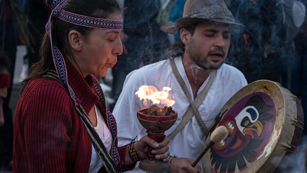 People performing a traditional evening ritual in Colombia.