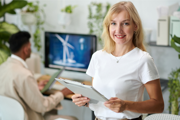 Person looking at chart depicting stakeholder intelligence reports for renewable energy company