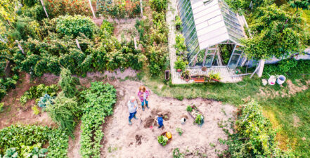 Two people in a community garden to represent ESG stakeholder engagement.